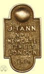 J Tann Escutcheon